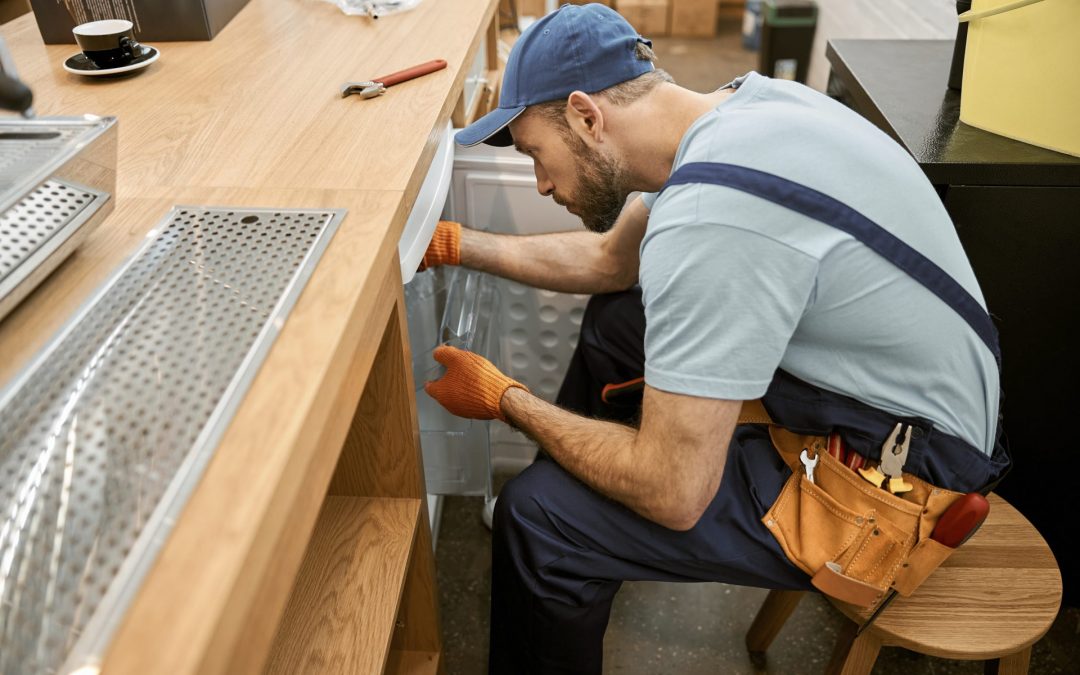 repairing-fridge-in-cafe Commercial Catering Equipment